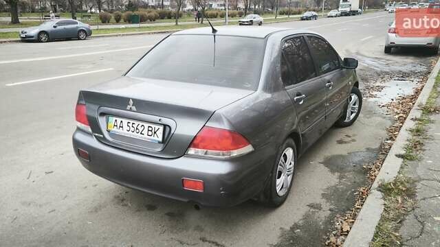 Серый Мицубиси Лансер, объемом двигателя 1.6 л и пробегом 263 тыс. км за 3650 $, фото 10 на Automoto.ua