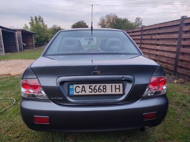 Сірий Міцубісі Lancer, об'ємом двигуна 1.6 л та пробігом 190 тис. км за 3500 $, фото 6 на Automoto.ua