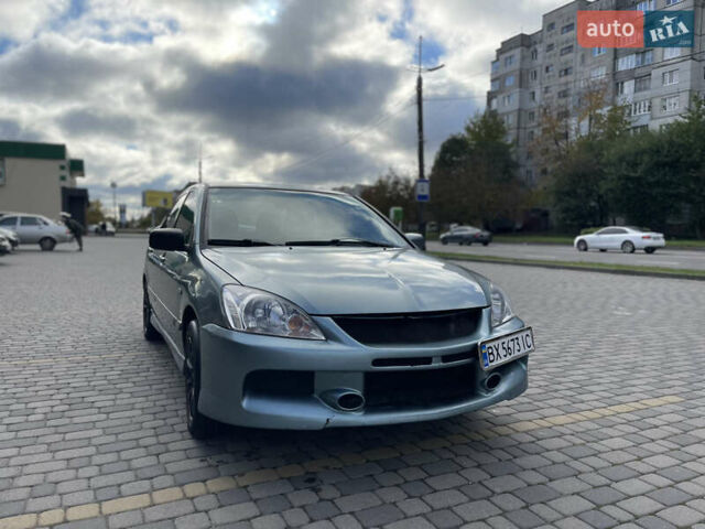 Серый Мицубиси Лансер, объемом двигателя 1.58 л и пробегом 350 тыс. км за 3300 $, фото 5 на Automoto.ua