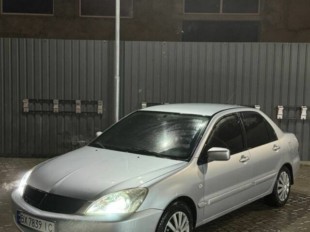 Серый Мицубиси Лансер, объемом двигателя 1.6 л и пробегом 330 тыс. км за 3200 $, фото 2 на Automoto.ua