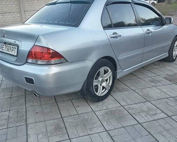 Мицубиси Лансер 2006 в Каменское - Днепродзержинск на Automoto.ua Серый Мицубиси Лансер, объемом двигателя 1.58 л и пробегом 238 тыс. км за 5400 $, фото 1 на Automoto.ua