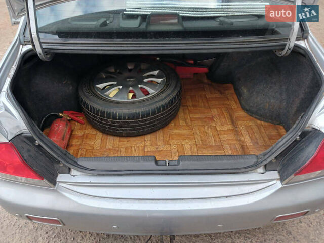 Серый Мицубиси Лансер, объемом двигателя 1.58 л и пробегом 215 тыс. км за 4000 $, фото 15 на Automoto.ua