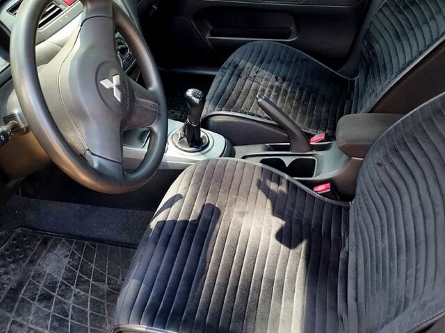 Серый Мицубиси Лансер, объемом двигателя 1.6 л и пробегом 214 тыс. км за 4500 $, фото 3 на Automoto.ua