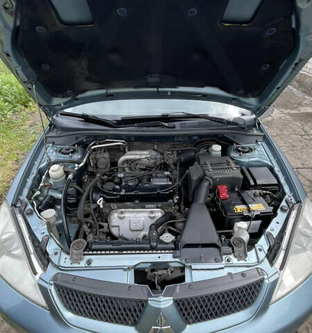 Сірий Міцубісі Lancer, об'ємом двигуна 1.58 л та пробігом 267 тис. км за 5300 $, фото 9 на Automoto.ua