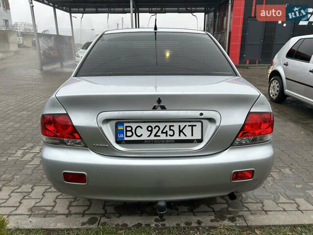 Сірий Міцубісі Lancer, об'ємом двигуна 1.6 л та пробігом 223 тис. км за 3900 $, фото 3 на Automoto.ua