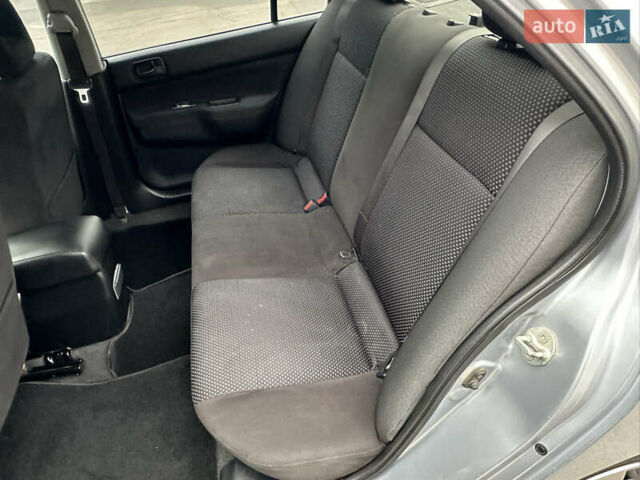 Серый Мицубиси Лансер, объемом двигателя 1.58 л и пробегом 183 тыс. км за 4800 $, фото 28 на Automoto.ua