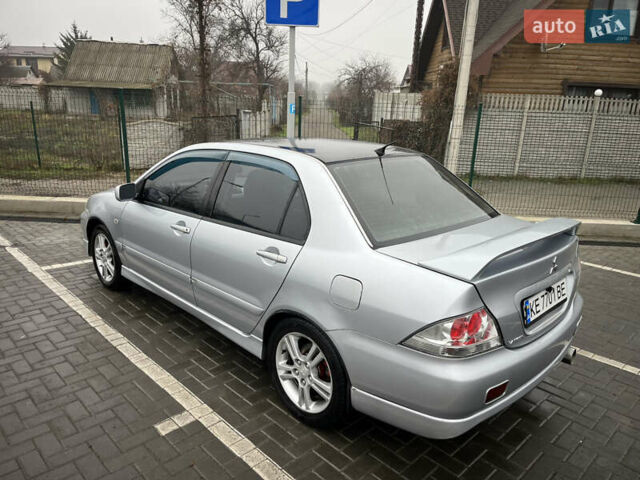 Сірий Міцубісі Lancer, об'ємом двигуна 2 л та пробігом 187 тис. км за 4500 $, фото 4 на Automoto.ua