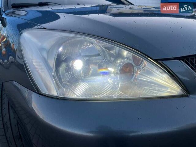 Серый Мицубиси Лансер, объемом двигателя 1.6 л и пробегом 279 тыс. км за 3990 $, фото 7 на Automoto.ua