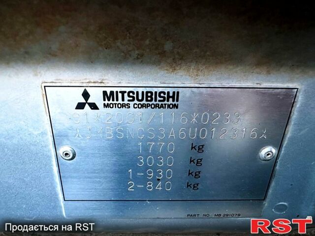 Серый Мицубиси Лансер, объемом двигателя 1.6 л и пробегом 211 тыс. км за 5000 $, фото 4 на Automoto.ua