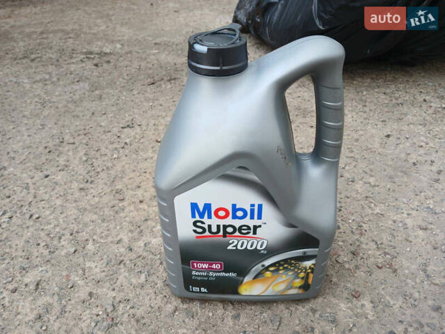 Серый Мицубиси Лансер, объемом двигателя 1.58 л и пробегом 215 тыс. км за 4000 $, фото 18 на Automoto.ua