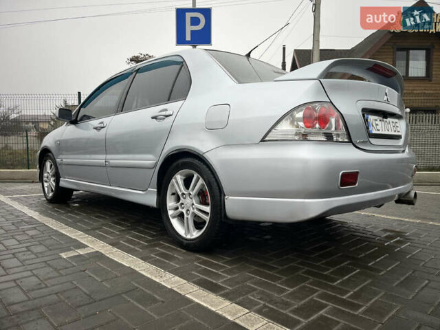 Сірий Міцубісі Lancer, об'ємом двигуна 2 л та пробігом 187 тис. км за 4500 $, фото 3 на Automoto.ua