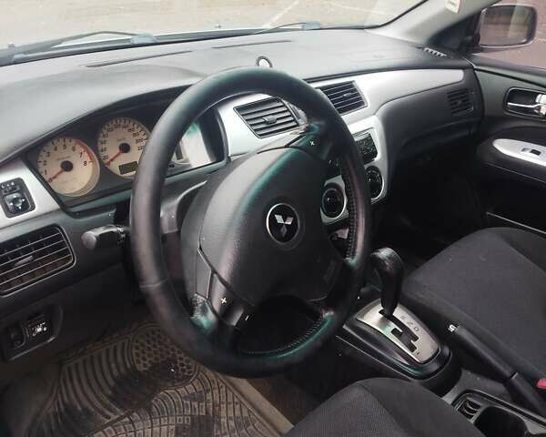Сірий Міцубісі Lancer, об'ємом двигуна 2 л та пробігом 330 тис. км за 3450 $, фото 3 на Automoto.ua