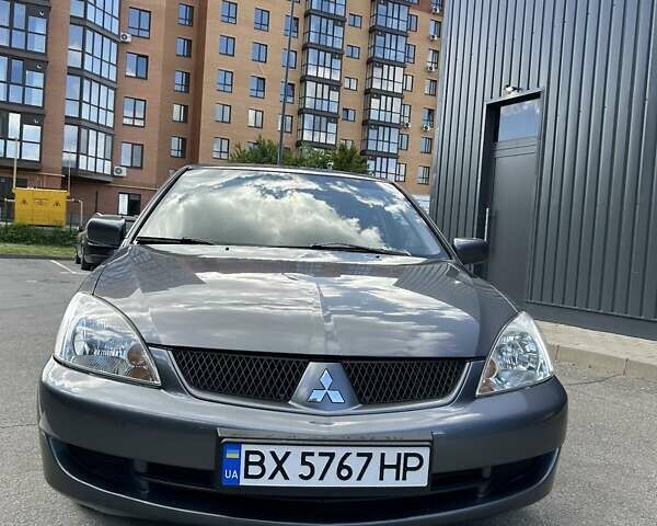Сірий Міцубісі Lancer, об'ємом двигуна 1.58 л та пробігом 160 тис. км за 4600 $, фото 5 на Automoto.ua