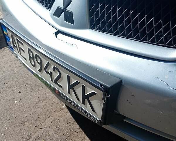 Сірий Міцубісі Lancer, об'ємом двигуна 1.58 л та пробігом 265 тис. км за 2900 $, фото 9 на Automoto.ua