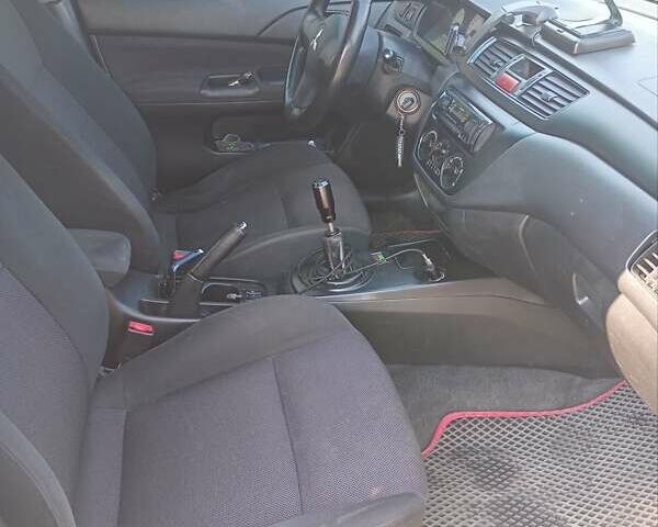 Сірий Міцубісі Lancer, об'ємом двигуна 1.58 л та пробігом 264 тис. км за 3200 $, фото 1 на Automoto.ua