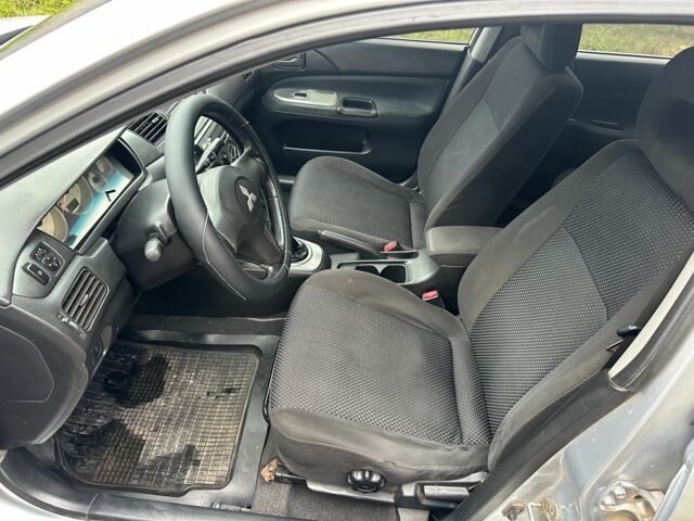 Сірий Міцубісі Lancer, об'ємом двигуна 1.6 л та пробігом 270 тис. км за 2900 $, фото 9 на Automoto.ua