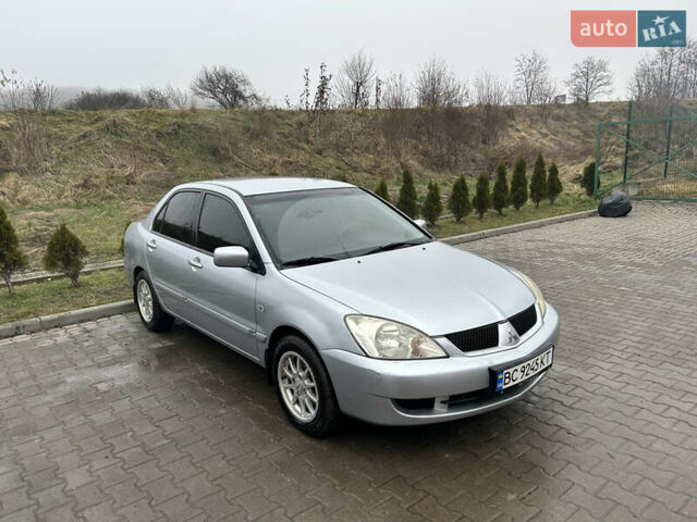 Сірий Міцубісі Lancer, об'ємом двигуна 1.6 л та пробігом 223 тис. км за 3900 $, фото 1 на Automoto.ua