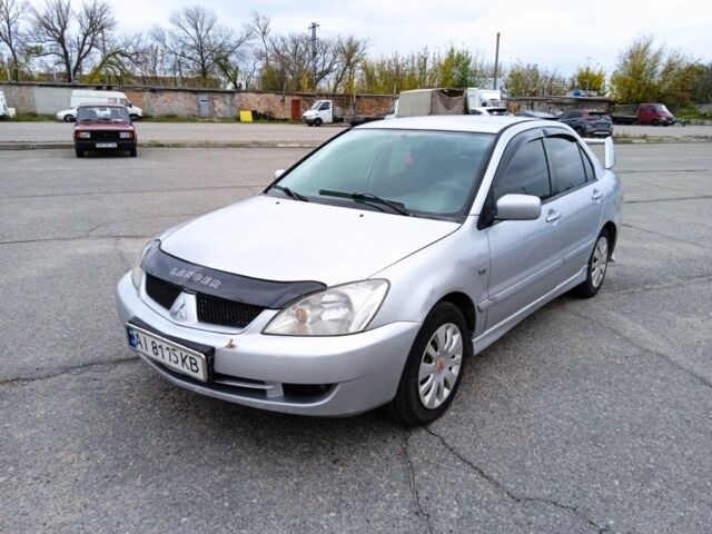 Сірий Міцубісі Lancer, об'ємом двигуна 1.6 л та пробігом 300 тис. км за 2999 $, фото 1 на Automoto.ua