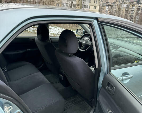 Серый Мицубиси Лансер, объемом двигателя 1.6 л и пробегом 208 тыс. км за 4100 $, фото 12 на Automoto.ua