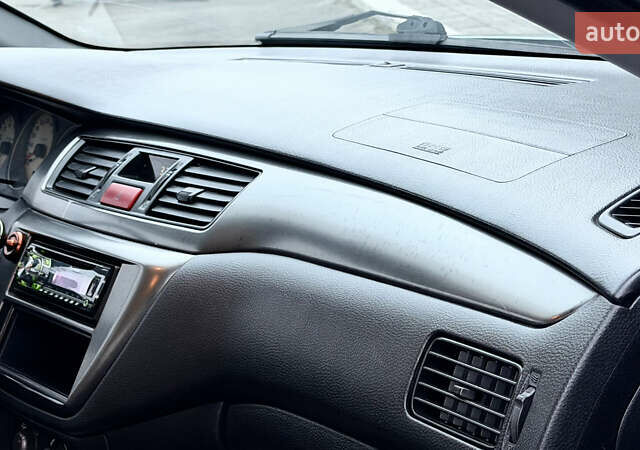 Сірий Міцубісі Lancer, об'ємом двигуна 1.58 л та пробігом 275 тис. км за 4600 $, фото 15 на Automoto.ua