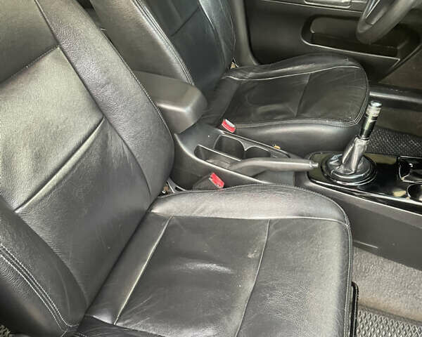 Сірий Міцубісі Lancer, об'ємом двигуна 1.6 л та пробігом 244 тис. км за 2999 $, фото 20 на Automoto.ua