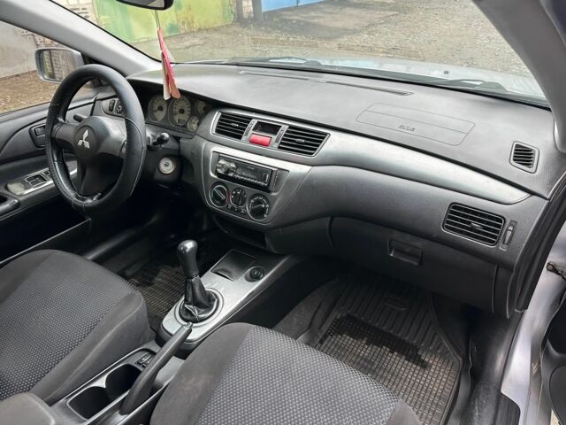 Сірий Міцубісі Lancer, об'ємом двигуна 1.6 л та пробігом 270 тис. км за 2900 $, фото 16 на Automoto.ua