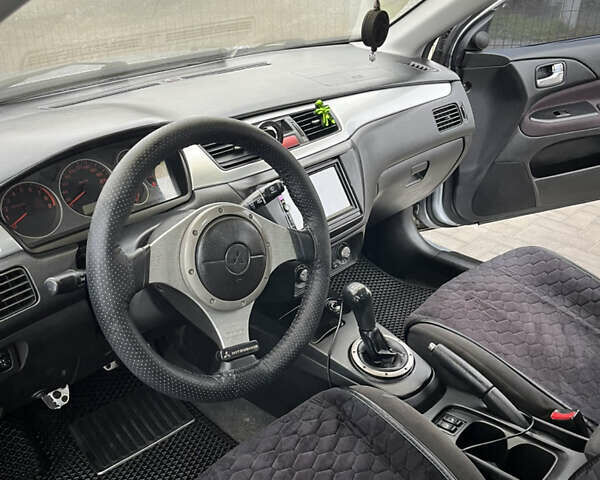 Сірий Міцубісі Lancer, об'ємом двигуна 2 л та пробігом 187 тис. км за 4500 $, фото 17 на Automoto.ua