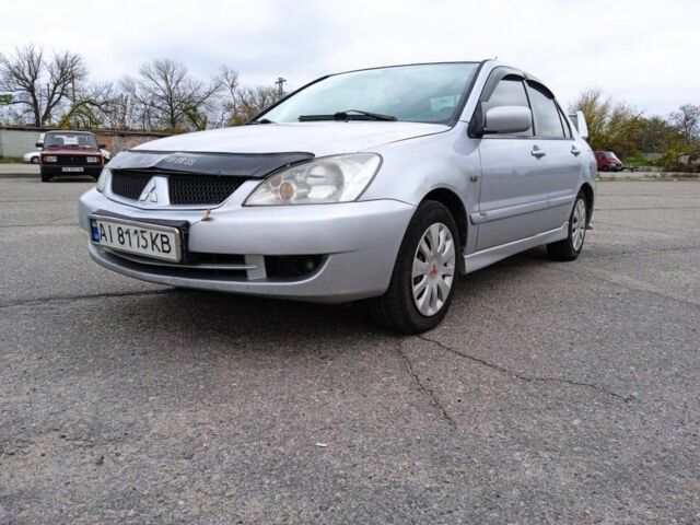 Сірий Міцубісі Lancer, об'ємом двигуна 1.6 л та пробігом 300 тис. км за 2999 $, фото 2 на Automoto.ua
