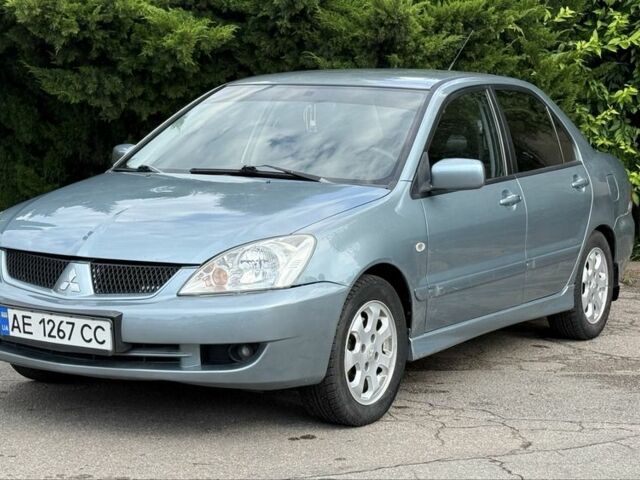 Серый Мицубиси Лансер, объемом двигателя 1.6 л и пробегом 220 тыс. км за 4400 $, фото 1 на Automoto.ua