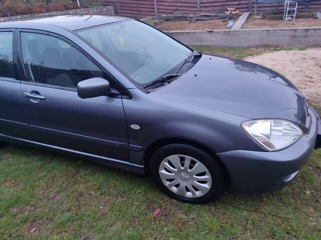 Сірий Міцубісі Lancer, об'ємом двигуна 1.6 л та пробігом 190 тис. км за 3500 $, фото 5 на Automoto.ua