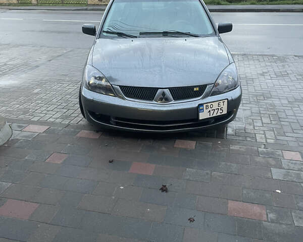 Сірий Міцубісі Lancer, об'ємом двигуна 1.6 л та пробігом 244 тис. км за 2999 $, фото 1 на Automoto.ua