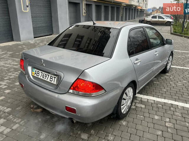 Серый Мицубиси Лансер, объемом двигателя 1.58 л и пробегом 333 тыс. км за 2800 $, фото 5 на Automoto.ua