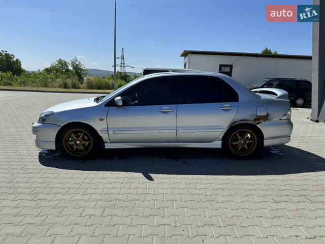 Мицубиси Лансер 2006 в Львове на Automoto.ua Серый Мицубиси Лансер, объемом двигателя 2 л и пробегом 272 тыс. км за 4999 $, фото 4 на Automoto.ua
