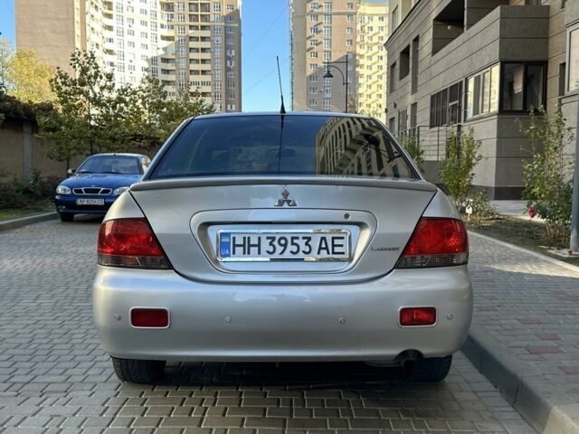 Мицубиси Лансер 2006 в Одессе на Automoto.ua Серый Мицубиси Лансер, объемом двигателя 1.6 л и пробегом 240 тыс. км за 4900 $, фото 3 на Automoto.ua