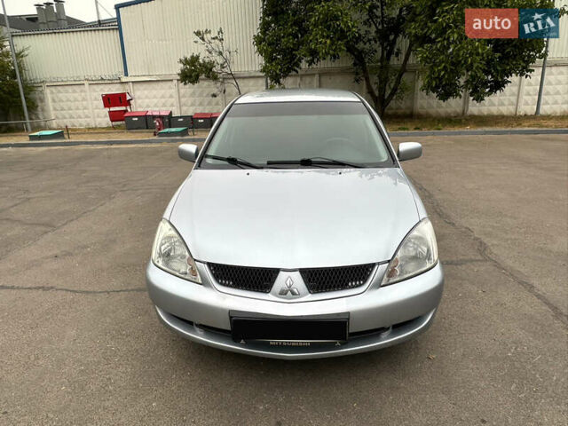 Серый Мицубиси Лансер, объемом двигателя 1.58 л и пробегом 183 тыс. км за 4800 $, фото 1 на Automoto.ua