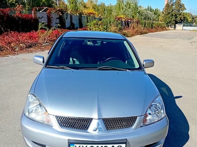 Сірий Міцубісі Lancer, об'ємом двигуна 1.6 л та пробігом 226 тис. км за 4000 $, фото 4 на Automoto.ua
