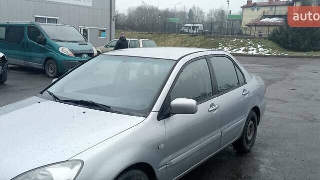 Сірий Міцубісі Lancer, об'ємом двигуна 1.6 л та пробігом 195 тис. км за 3800 $, фото 3 на Automoto.ua