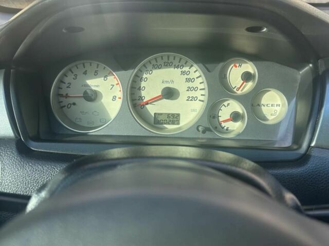 Серый Мицубиси Лансер, объемом двигателя 1.6 л и пробегом 170 тыс. км за 3700 $, фото 8 на Automoto.ua