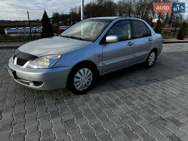 Сірий Міцубісі Lancer, об'ємом двигуна 1.58 л та пробігом 333 тис. км за 2999 $, фото 5 на Automoto.ua