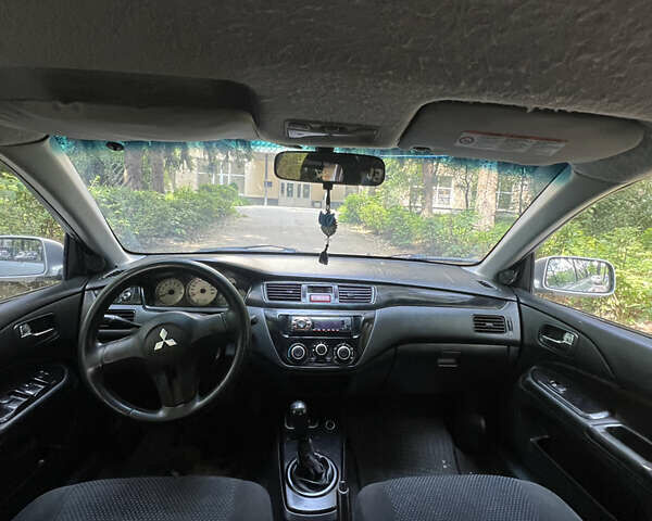 Сірий Міцубісі Lancer, об'ємом двигуна 1.6 л та пробігом 333 тис. км за 2600 $, фото 7 на Automoto.ua
