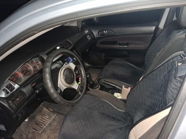 Сірий Міцубісі Lancer, об'ємом двигуна 2 л та пробігом 1000 тис. км за 3600 $, фото 1 на Automoto.ua