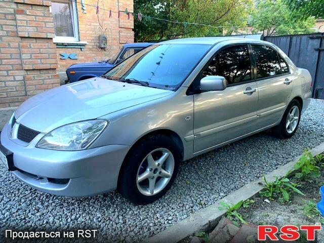 Серый Мицубиси Лансер, объемом двигателя 1.6 л и пробегом 0 тыс. км за 3999 $, фото 1 на Automoto.ua