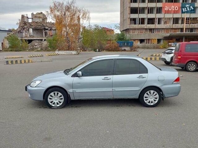 Мицубиси Лансер 2006 в Киеве на Automoto.ua Серый Мицубиси Лансер, объемом двигателя 1.6 л и пробегом 426 тыс. км за 3800 $, фото 3 на Automoto.ua