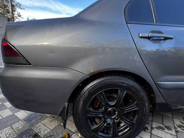 Сірий Міцубісі Lancer, об'ємом двигуна 0 л та пробігом 279 тис. км за 3700 $, фото 14 на Automoto.ua