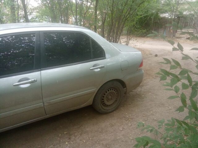 Сірий Міцубісі Lancer, об'ємом двигуна 1.6 л та пробігом 3 тис. км за 3200 $, фото 6 на Automoto.ua