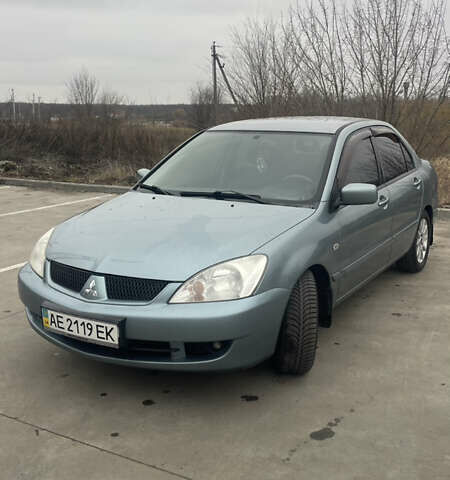 Сірий Міцубісі Lancer, об'ємом двигуна 1.58 л та пробігом 267 тис. км за 5300 $, фото 1 на Automoto.ua