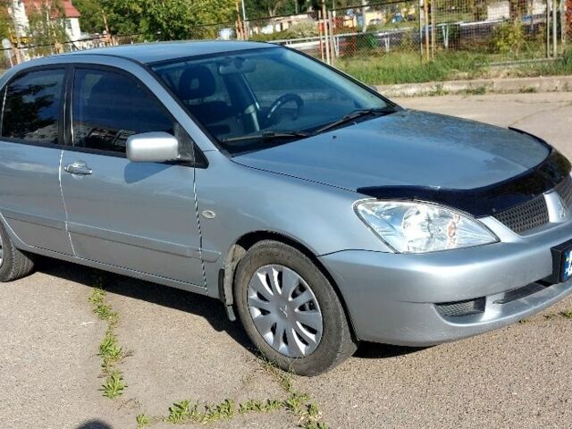 Сірий Міцубісі Lancer, об'ємом двигуна 0 л та пробігом 159 тис. км за 4500 $, фото 10 на Automoto.ua