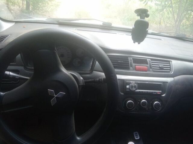 Сірий Міцубісі Lancer, об'ємом двигуна 1.6 л та пробігом 3 тис. км за 3200 $, фото 3 на Automoto.ua