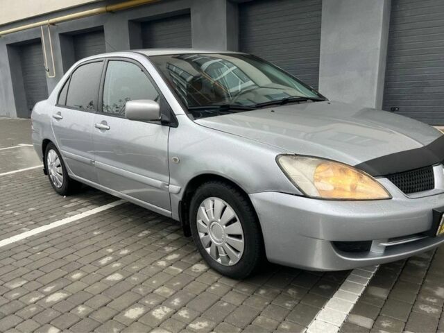 Серый Мицубиси Лансер, объемом двигателя 1.6 л и пробегом 333 тыс. км за 2800 $, фото 3 на Automoto.ua