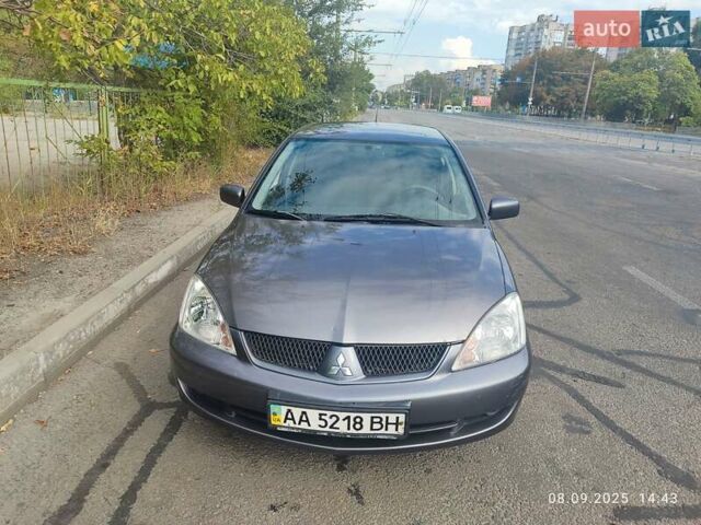 Сірий Міцубісі Lancer, об'ємом двигуна 1.6 л та пробігом 242 тис. км за 4900 $, фото 6 на Automoto.ua